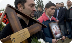 Robert Csorba, 27, and his 4-year-old son, Robert, were killed as they tried to escape from their burning home in Tatarszentgyorgy. (Photo: Sandor Ujvari/MTI)